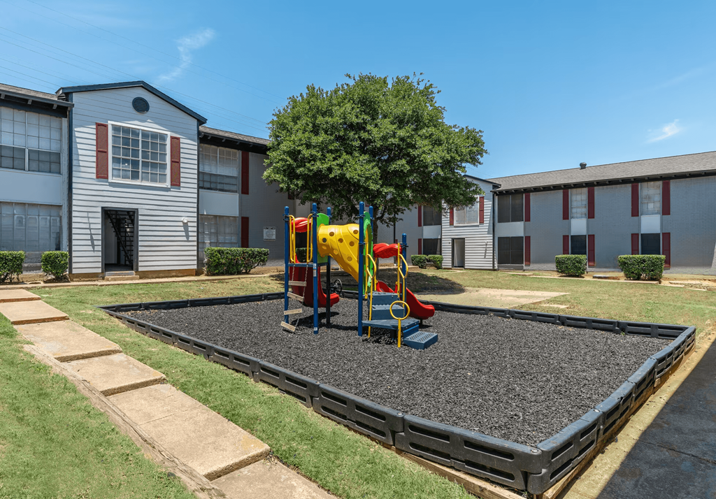 playground at the whispering winds apartments in pearland, tx