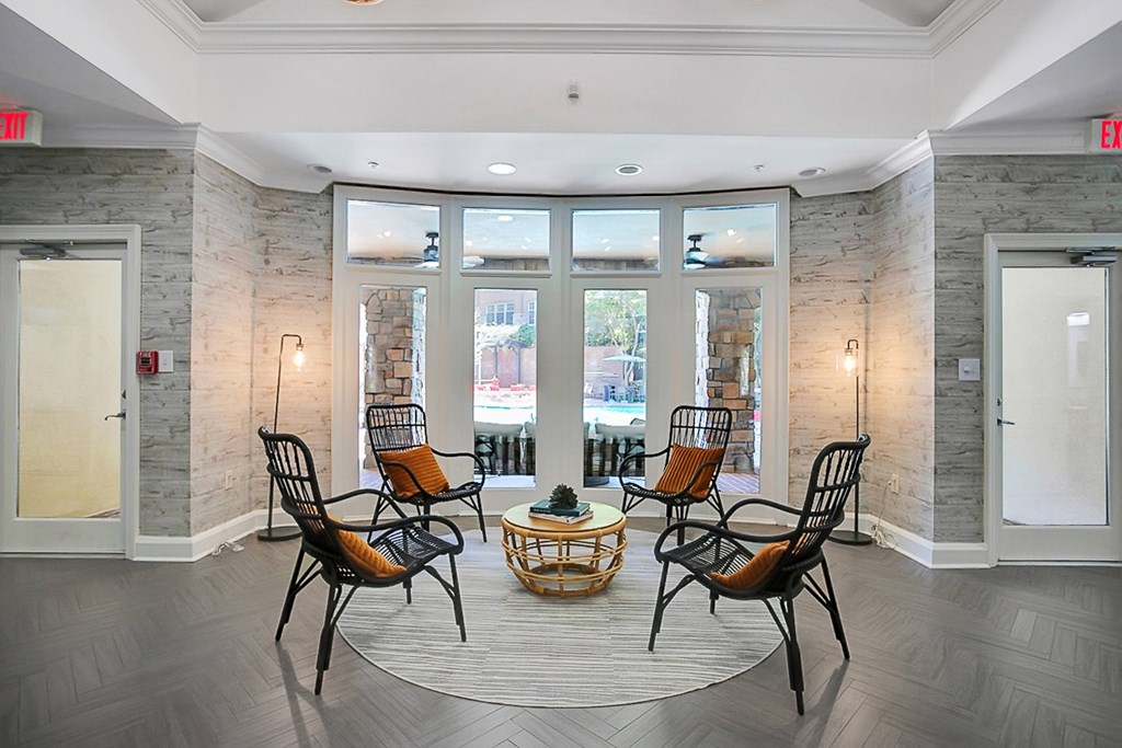 the preserve at cardinal courts lobby with chairs and a table