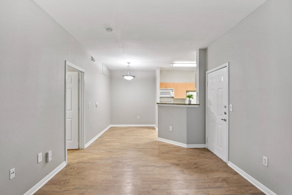 living area with ceiling lights and hardwood like flooring