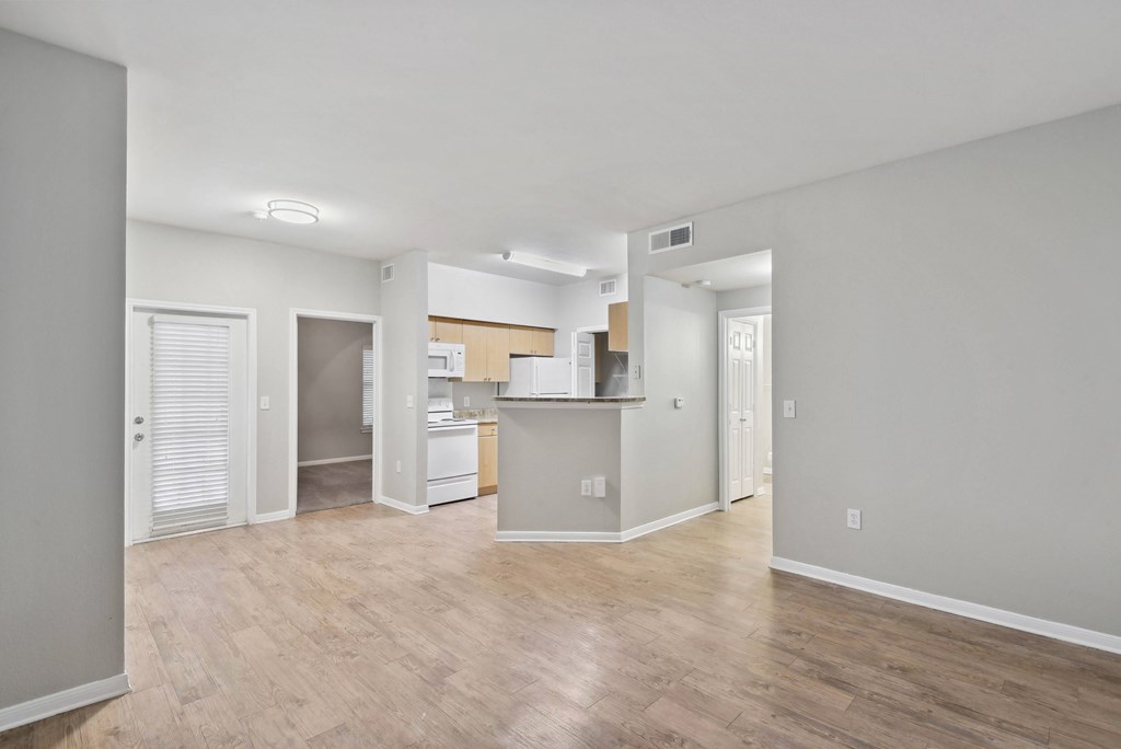 living area with ceiling lights and hardwood like flooring