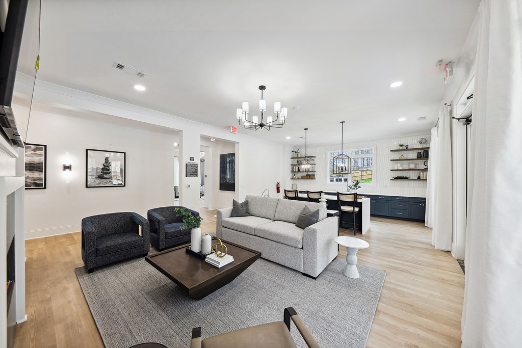 a living room with a couch and a table