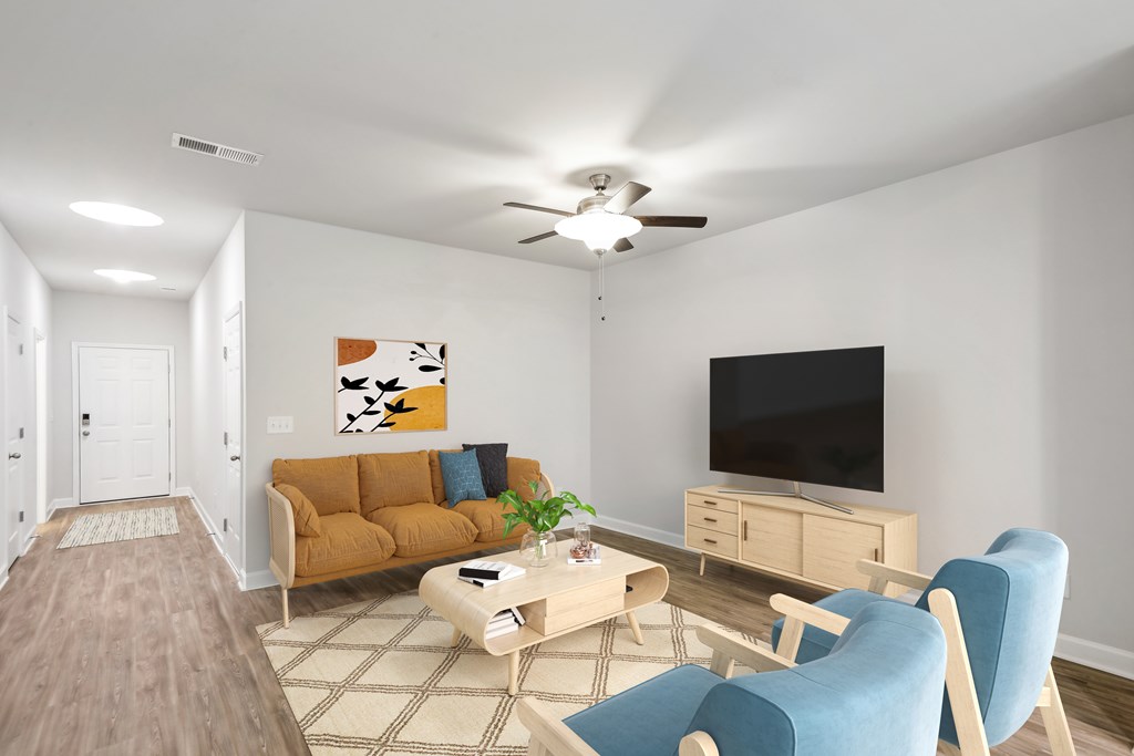 a living room with a couch and a tv