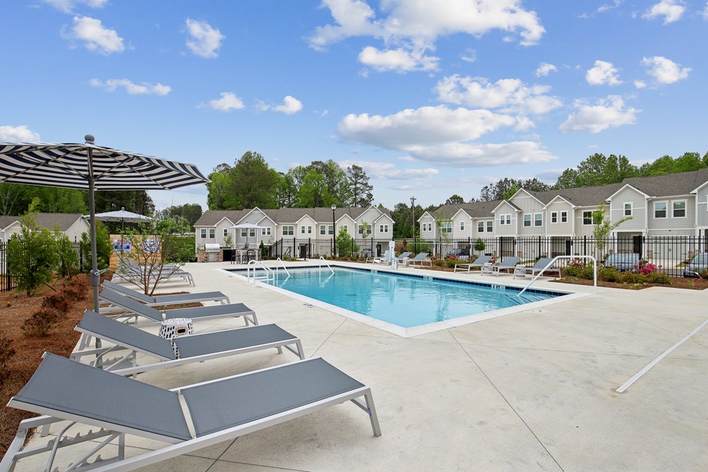 our apartments have a resort style pool with lounge chairs