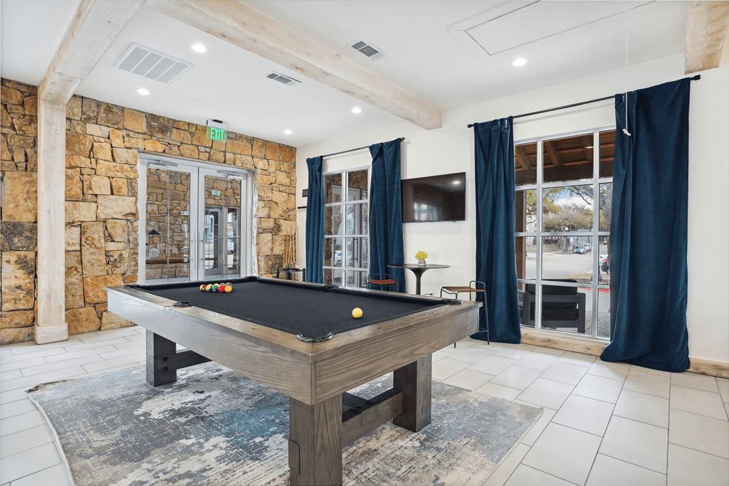 Resident lounge with billiards table and entertainment kitchen