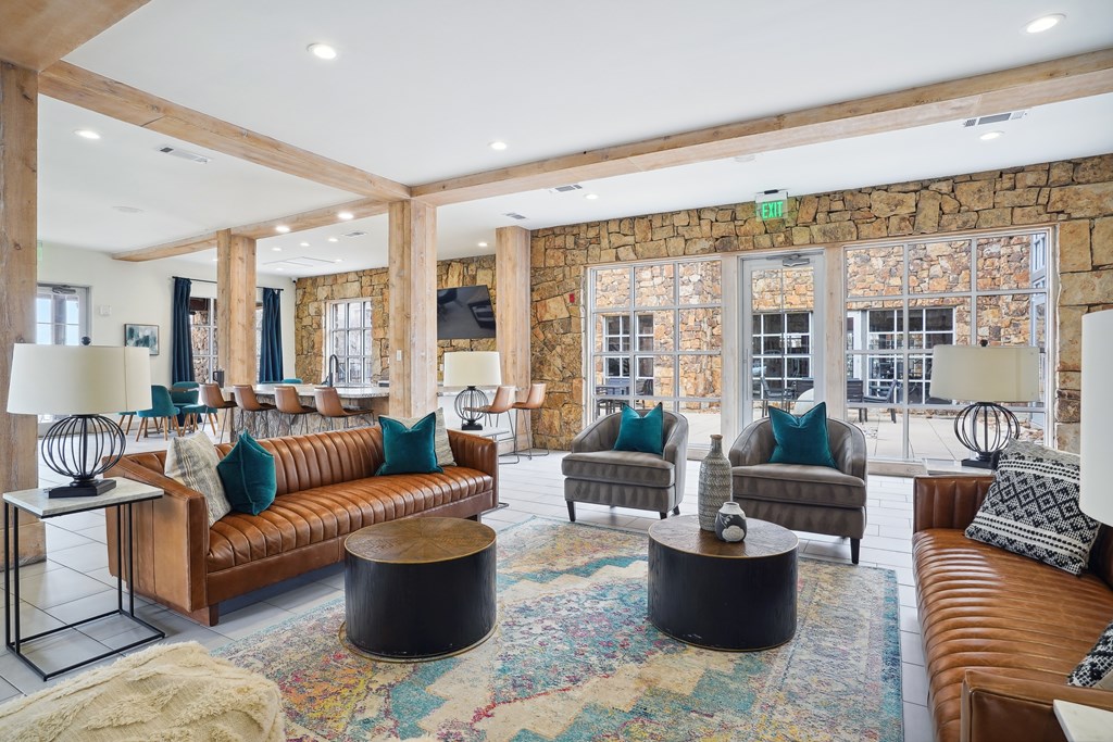 Resident lounge with seating area and entertainment kitchen