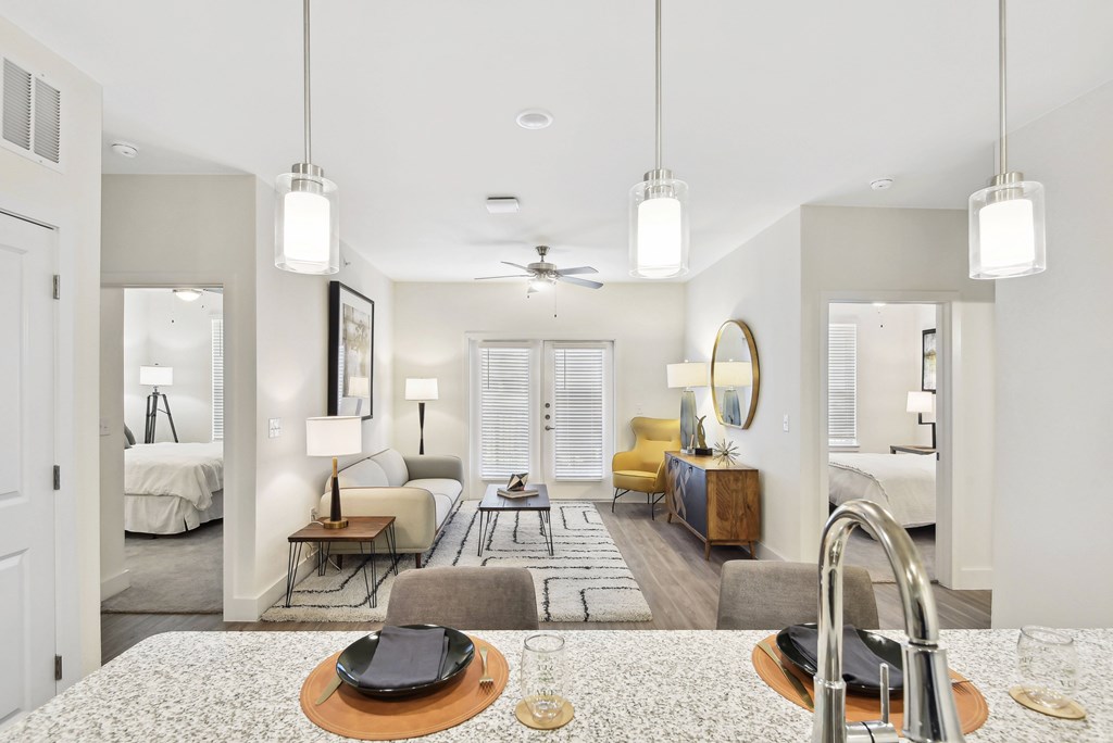 a living room with a couch and a table