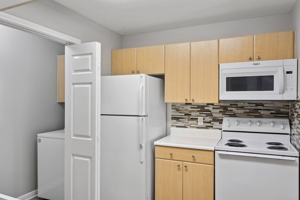 kitchen with attached laundry room