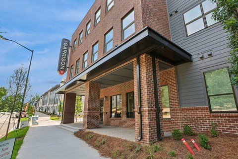 The image shows a building with a sign that reads "CARRISON".