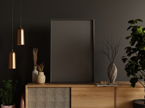 A modern room with a flat screen TV on a wooden cabinet.