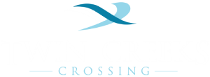 A logo with the words "Twin Creeks Crossing" and a stylized water symbol.