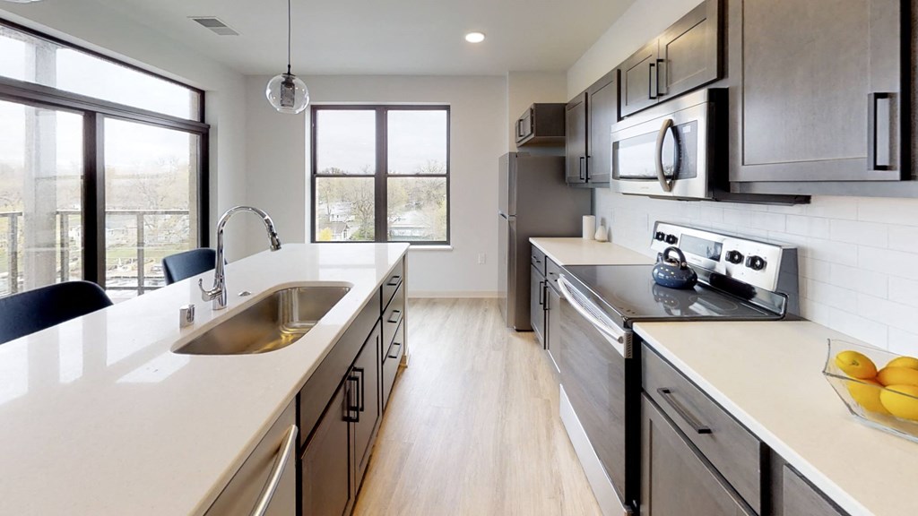 Amenity, Luxury, Resident, Apartment, High End, Modern Finishes, LVP Flooring, Quartz Countertops, Stainless Steel Appliances, High Ceilings, In Unit Washer and Dryer
