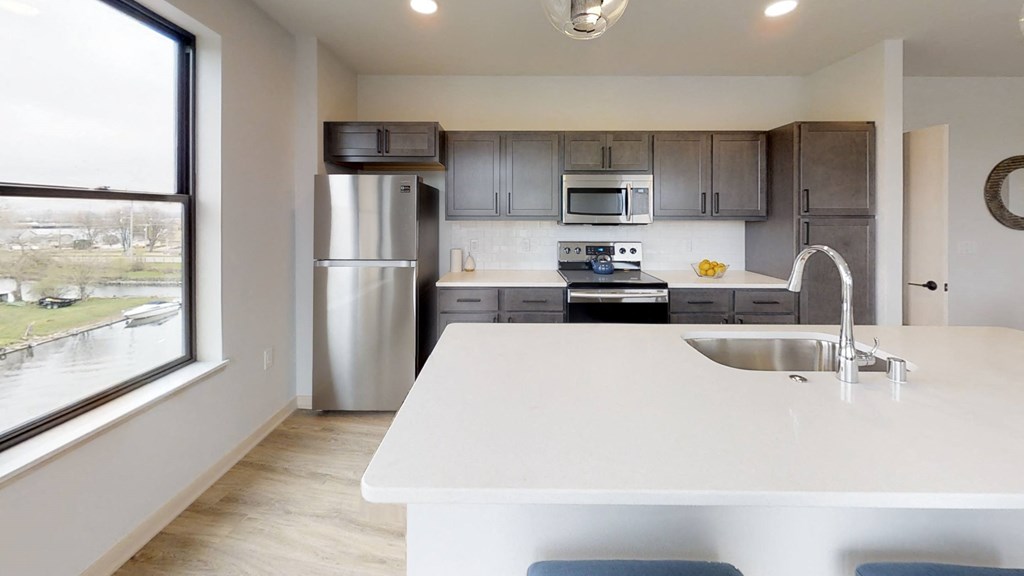 Amenity, Luxury, Resident, Apartment, High End, Modern Finishes, LVP Flooring, Quartz Countertops, Stainless Steel Appliances, High Ceilings, In Unit Washer and Dryer