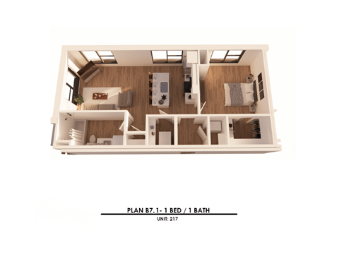 A diagram of a bedroom with a bed, a bathroom, and a living area.