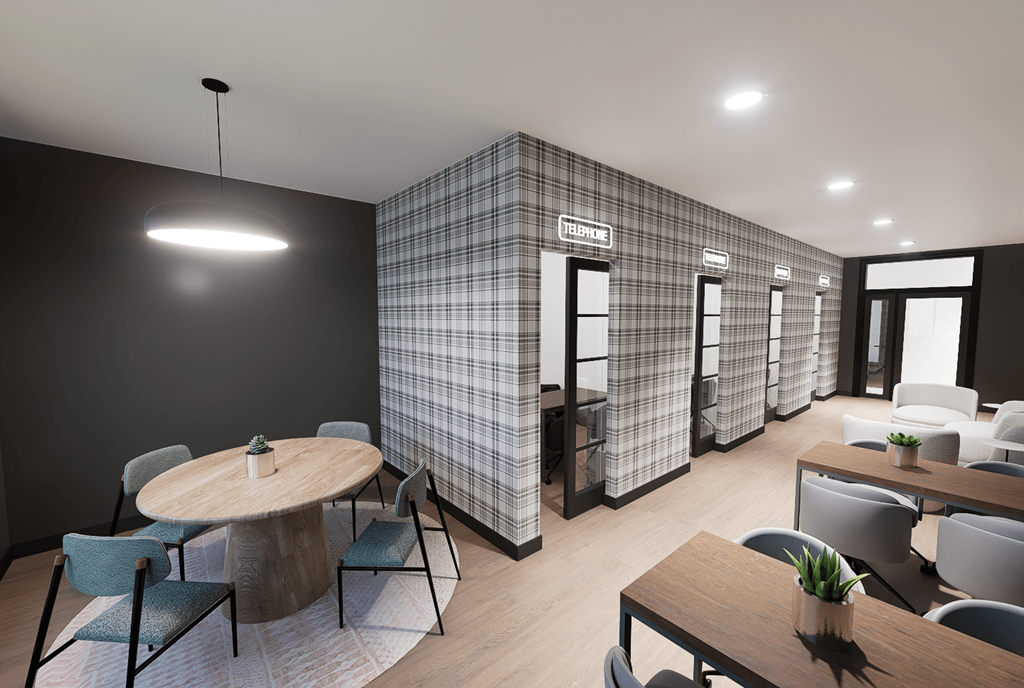 A modern dining area with a round table and chairs.