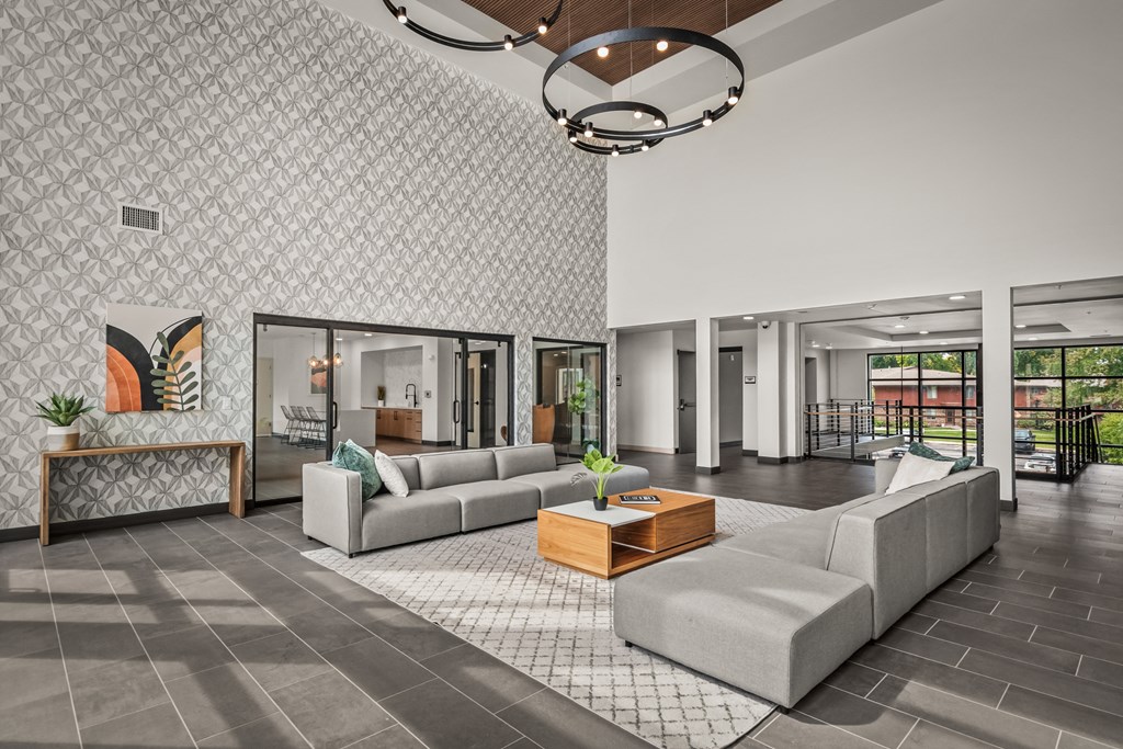 a living room with couches and a coffee table