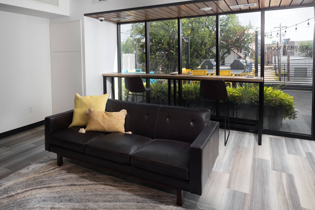 Lounge space in the community room at The Landing at 1001 NP, Fargo, North Dakota 58102
