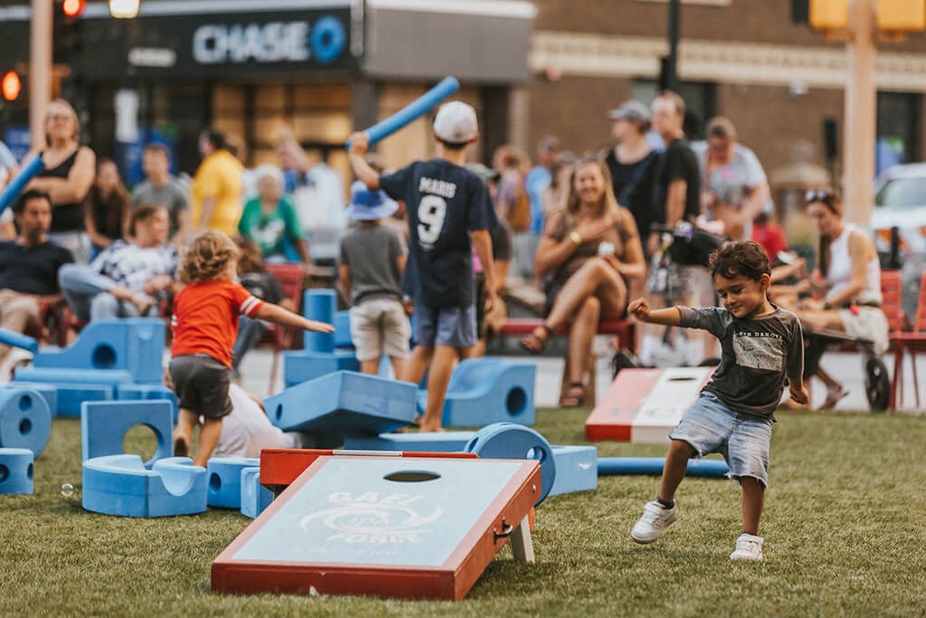 Kids playing at Kesler Apartments in Downtown Fargo, Fargo, 58102