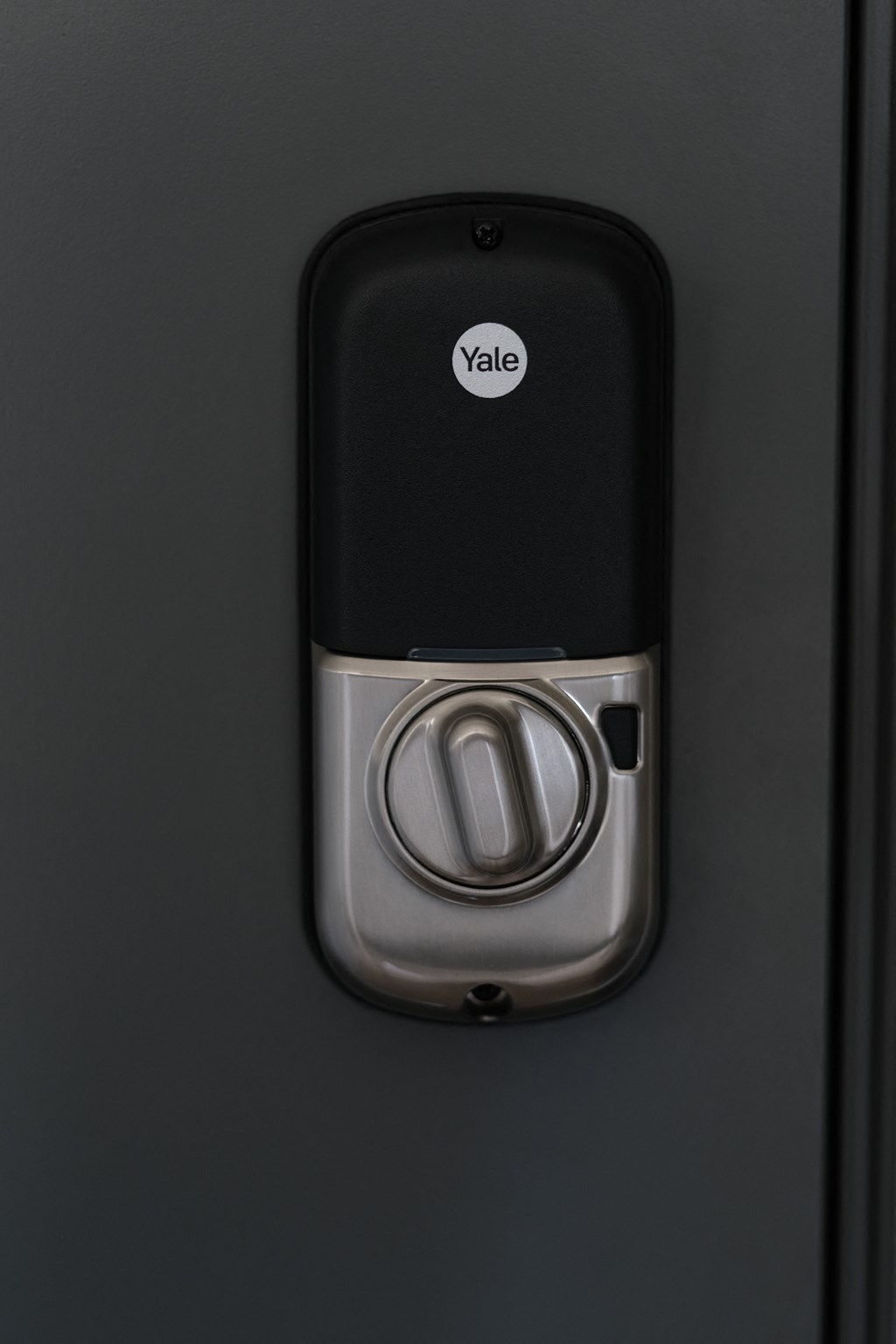 door sensor on a black door at Riverhouse Apartments, Fargo, ND