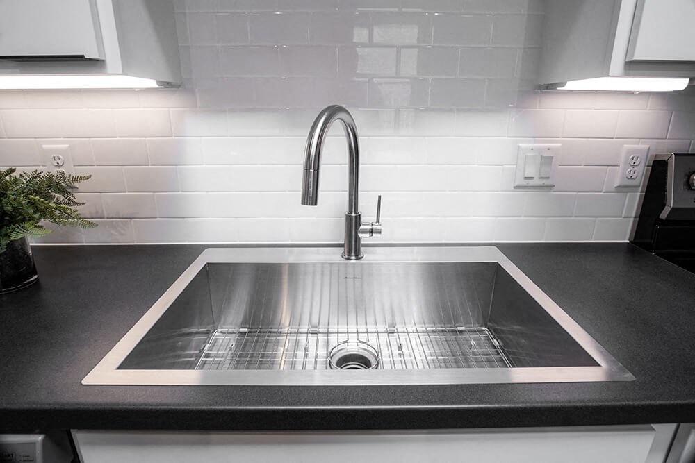 Sink in the kitchen at Bostad Apartments, Fargo, ND 58102