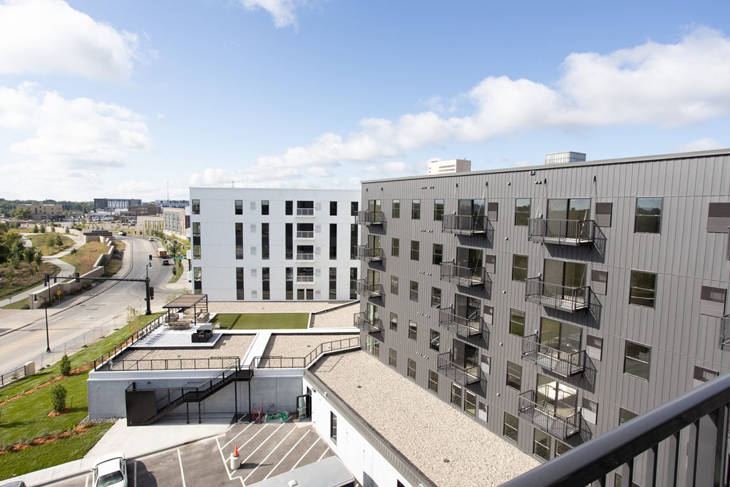 the view from the balcony of an apartment building at Riverhouse Apartments, Fargo, North Dakota