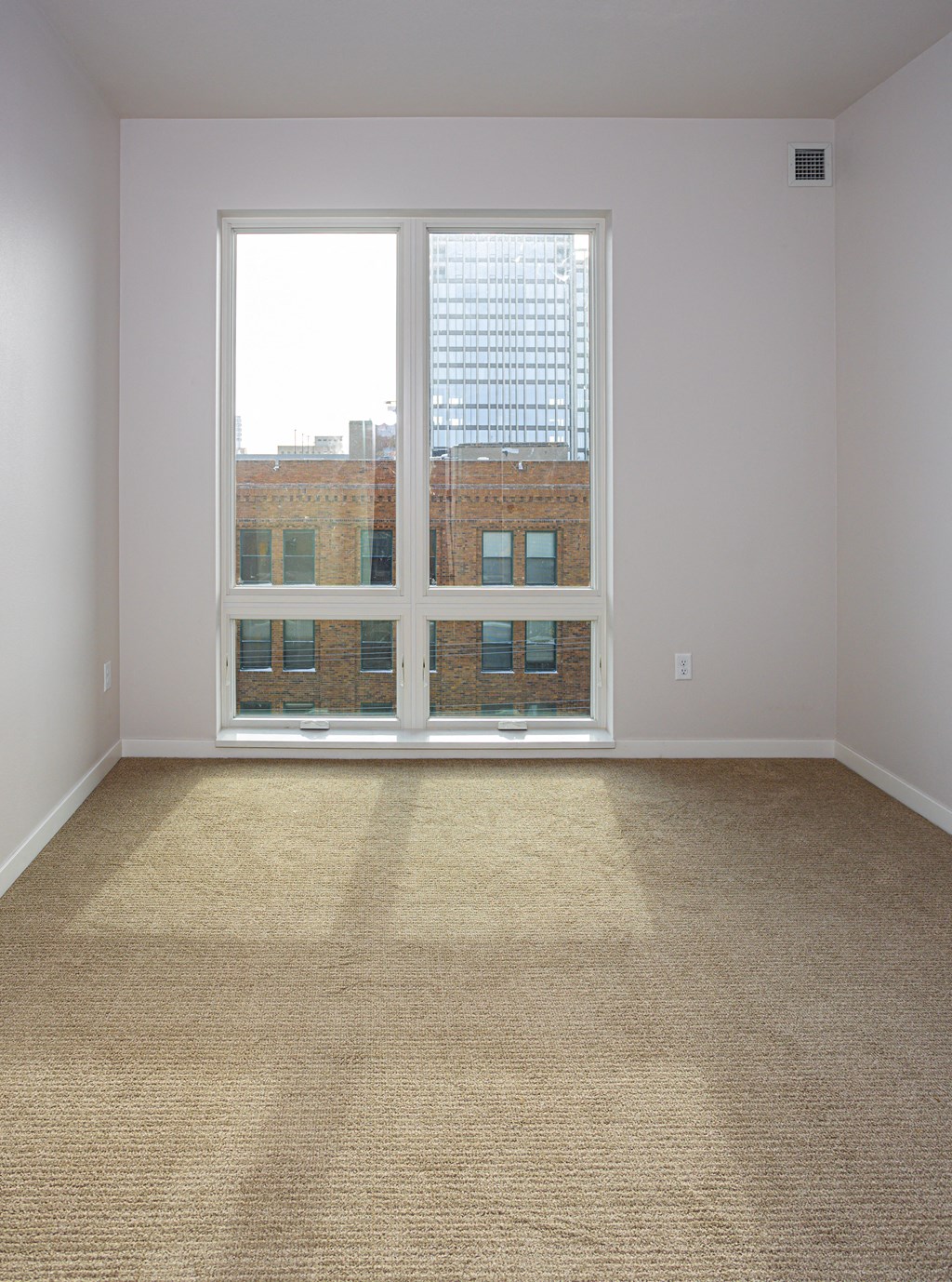 Carpeted Living Room at Mercantile on Broadway, Fargo, ND, 58102