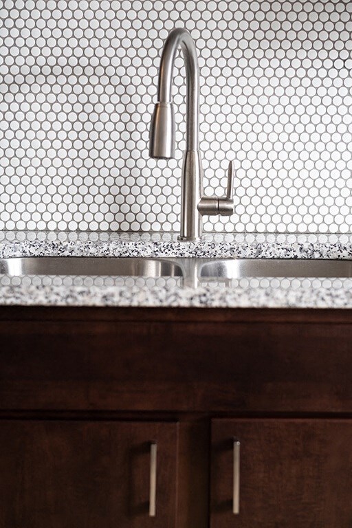 a kitchen with a sink and a faucet at RoCo Apartments, Fargo, ND 58102