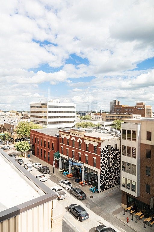 a city street filled with lots of traffic at RoCo Apartments, Fargo, ND, 58102