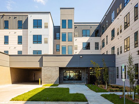 a view of the front of the building on a sunny day at The Landing at 1001 NP, Fargo, ND, 58102