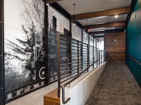 a large black and white photo of an old locomotive is displayed on the wall of the at 1001 NP, Fargo, North Dakota 58102