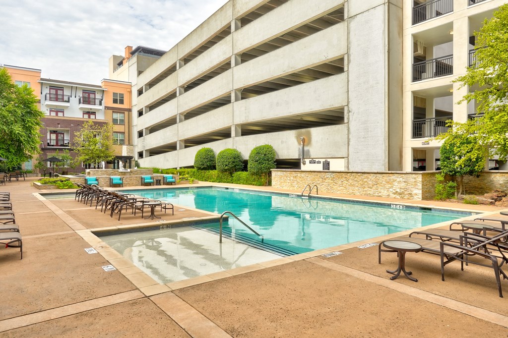 our apartments have a large pool and lounge chairs