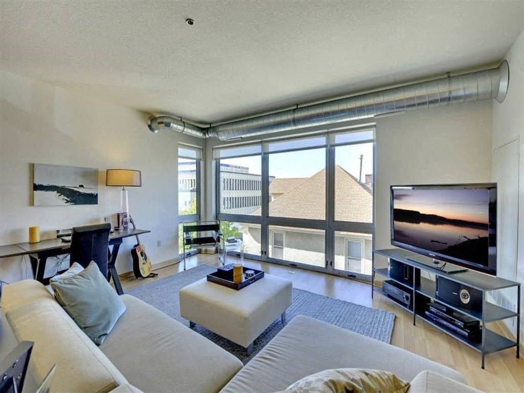 a living room with a couch and a television