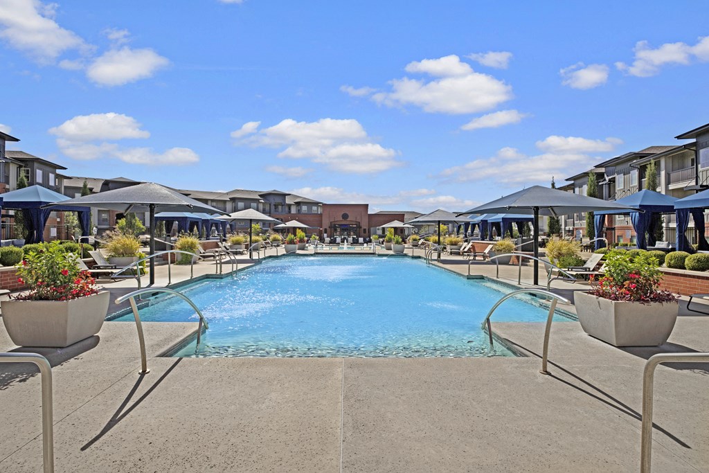 a swimming pool at the resort on a sunny day