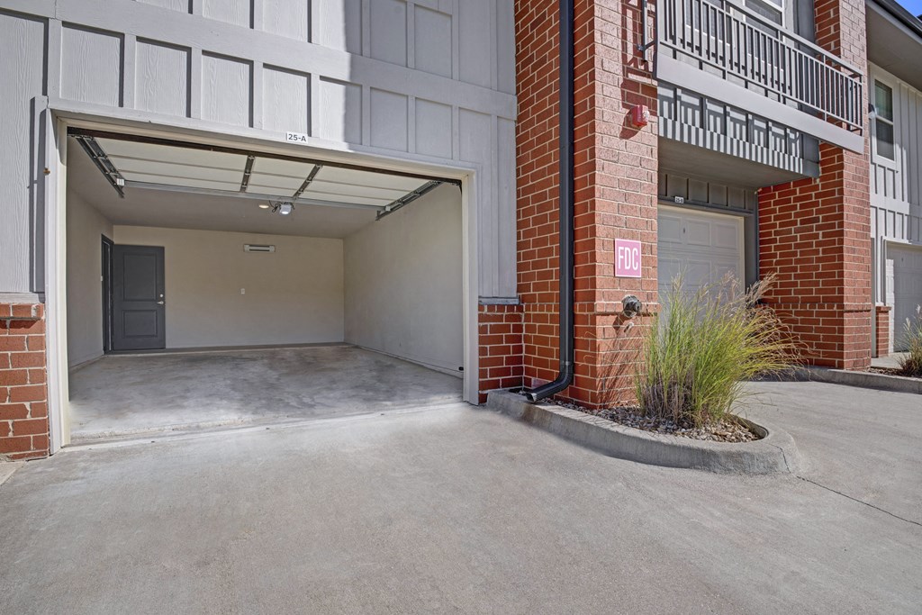 the entrance to a building with an empty parking garage