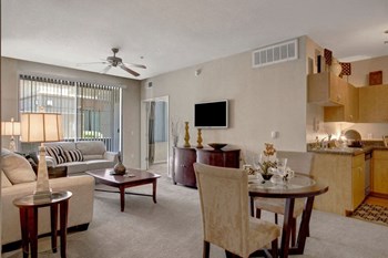 Bolero Apartments Bolero Apartments Living room with couch - Photo Gallery 5