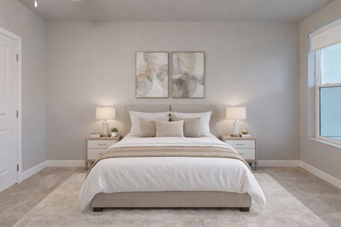 A serene bedroom here at Experience at Epicenter featuring plush carpet, soft neutral walls, and a centered upholstered bed dressed in layered white and beige bedding. Matching nightstands with table lamps frame the bed beneath modern wall art, while a window with simple shades allows natural light to brighten the calm, inviting space.