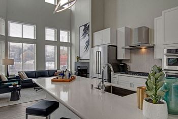 Quartz countertops with under-mount sinks and custom cabinets