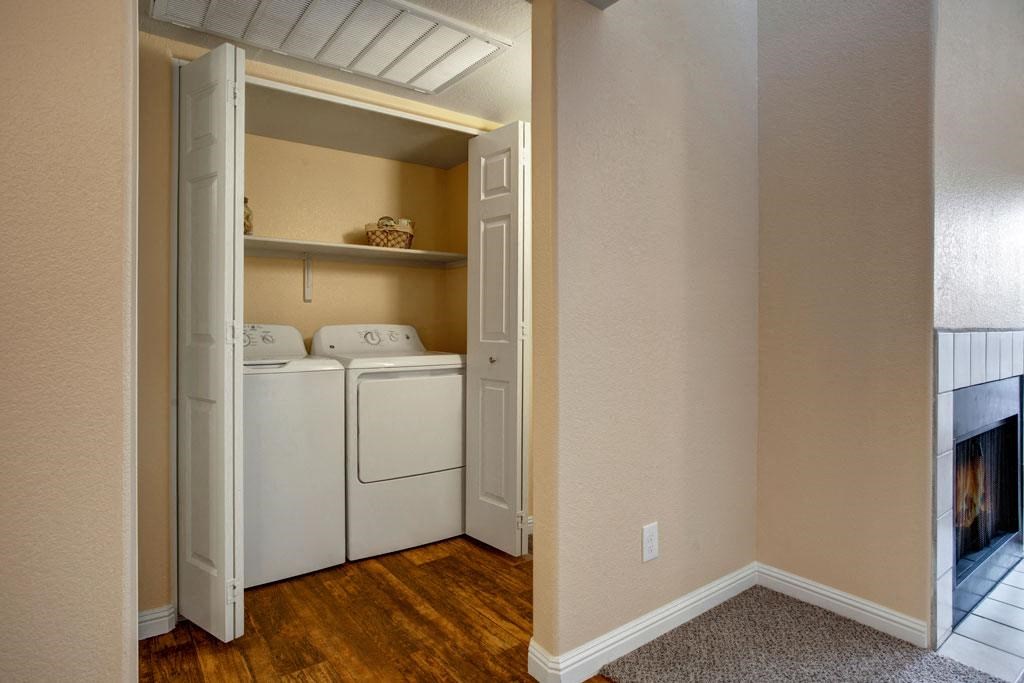 a laundry room with a washer and dryer