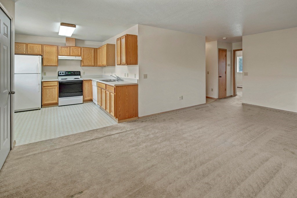 The Legacy Apartments - Kitchen and Living Room