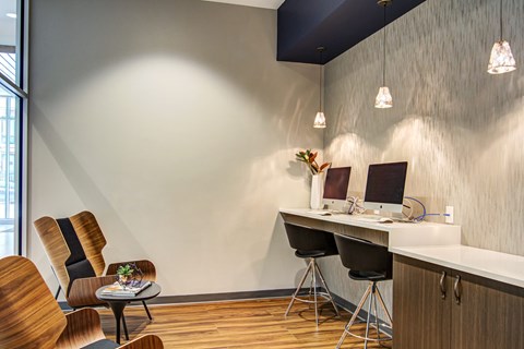 A modern resident business center or internet cafe station at the LPM Apartments in Minneapolis.