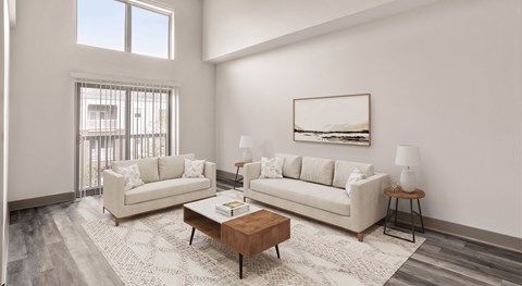 A living room with two couches, a coffee table, and a painting on the wall.