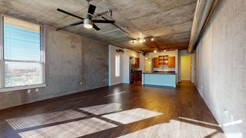 10-foot exposed concrete ceilings and walls