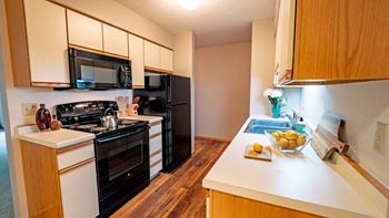 Vaulted Ceiling*  (In select units)