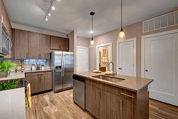 River House kitchen w/ wooden floor -  Dean Weidner Real Estate