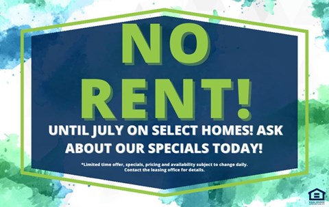 A sign advertising no rent until July on select homes.