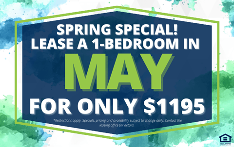 A sign advertises a special offer to lease a 1-bedroom apartment in May for only $1195.