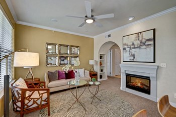 Tuscany Living Room with Fireplace and Ceiling Fan - Photo Gallery 2