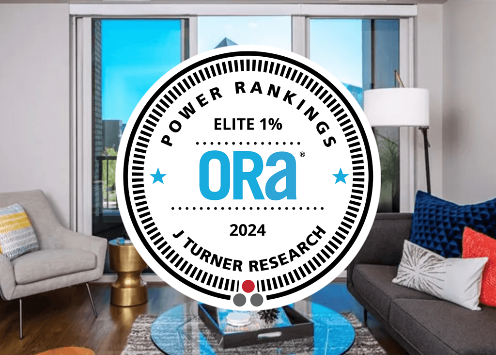 A living room with a circular logo overlay that reads "POWER RANKINGS ELITE 1% Ora 2024 J TURNER RESEARCH".