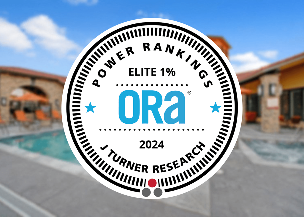A badge with the text "POWER RANKINGS ELITE 1%" and "ORA 2024" is displayed in front of a poolside scene.
