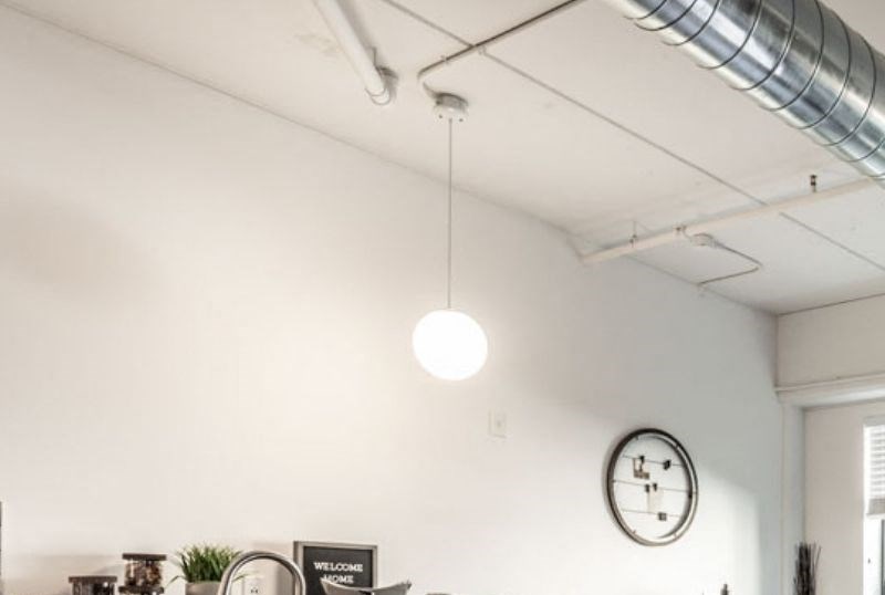 Vim + Vigor industrial style livingroom Vim + Vigor Lofts industrial style livingroom with bright natural lighting - Photo Gallery 5