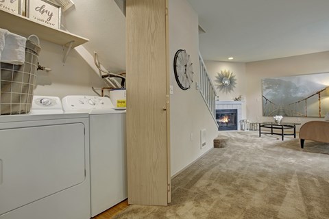 A laundry room with a washer and dryer.